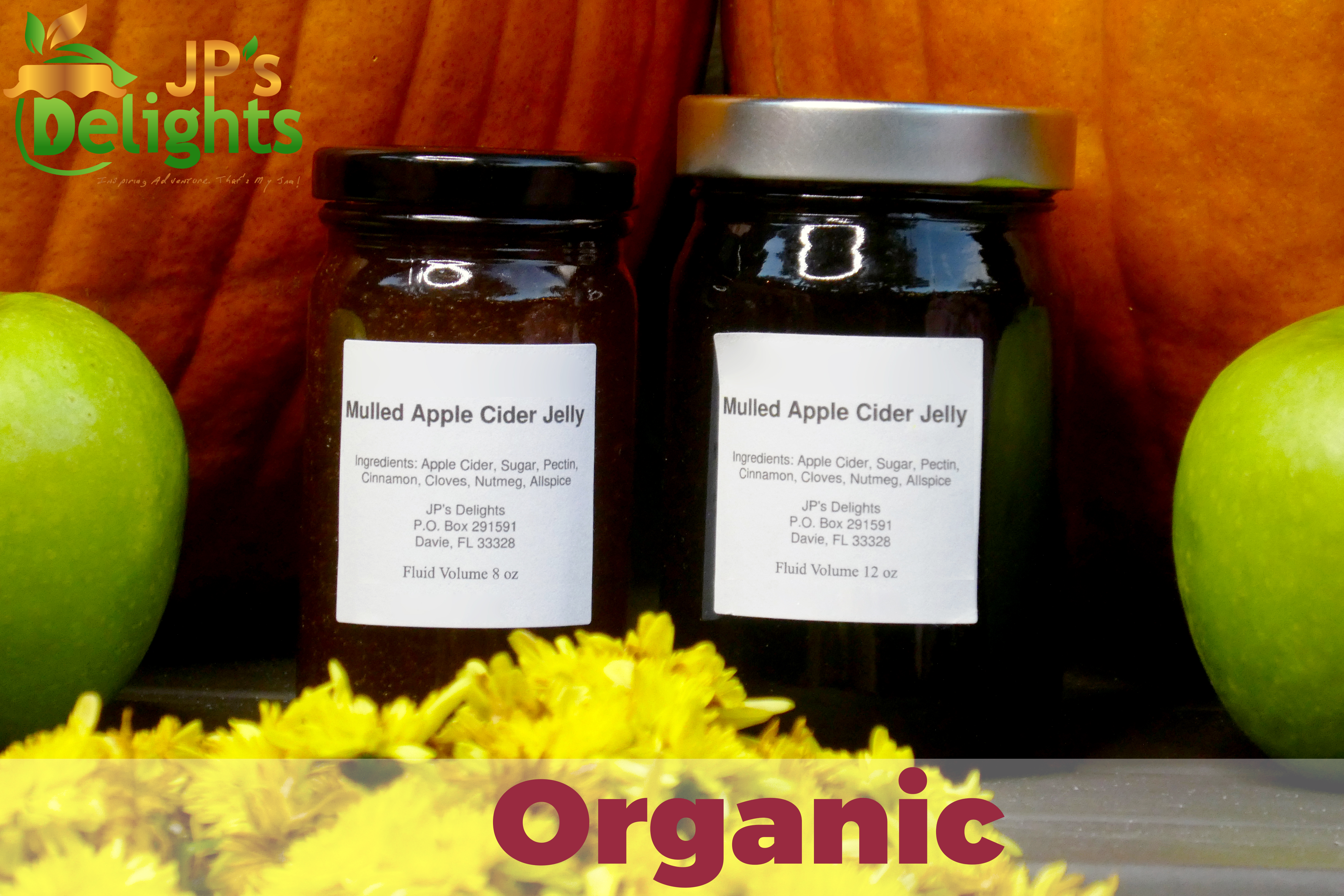 Organic 8 and 12 oz jars of Apple Cider Jelly close up with a fall theme