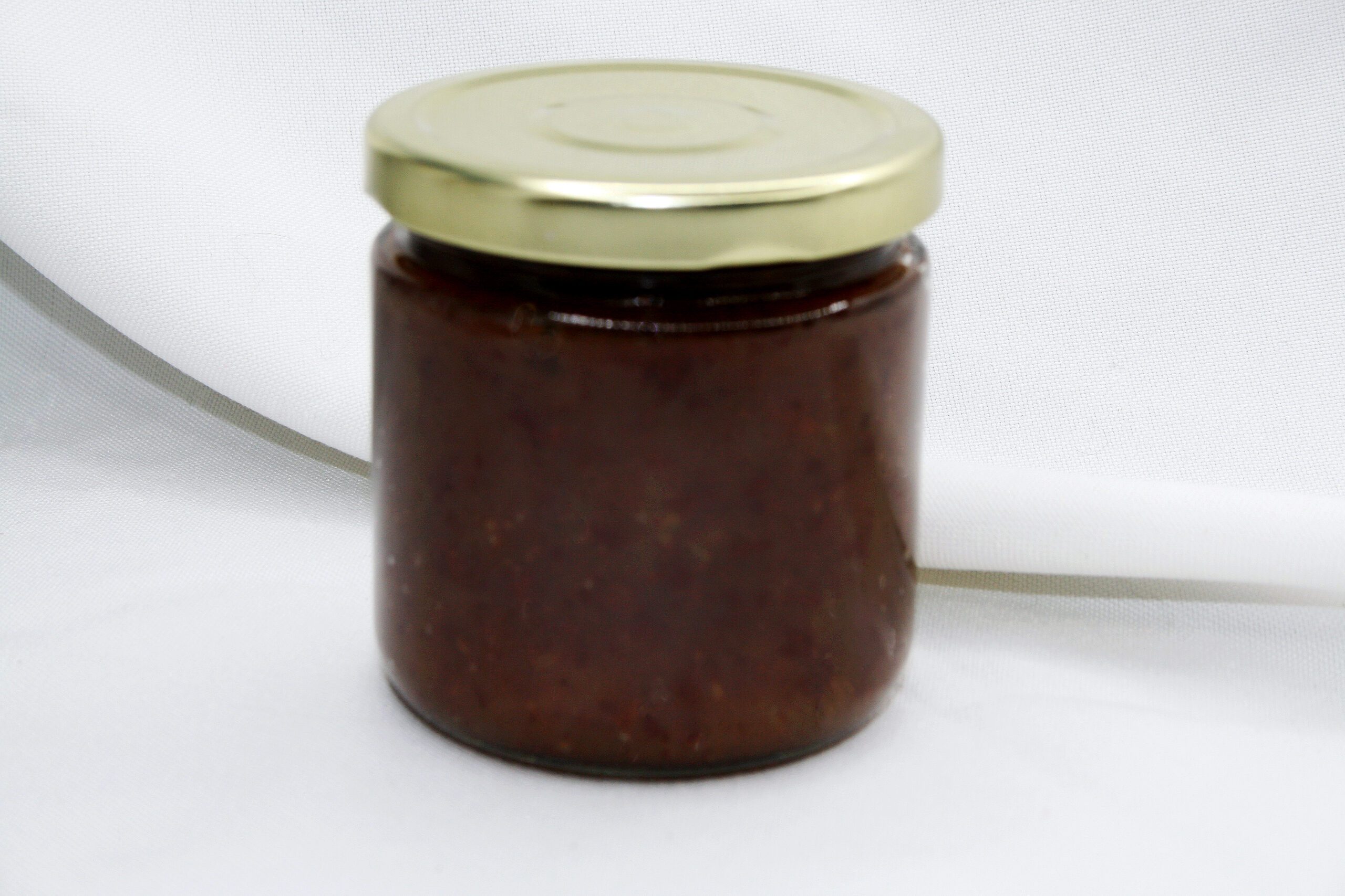 8 oz jar of Charoses Jam