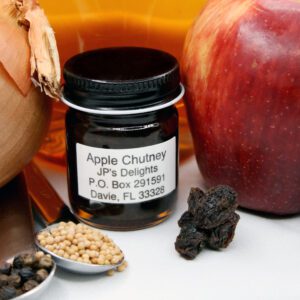 1.5 oz jar of Apple Chutney surrounded by its ingredients
