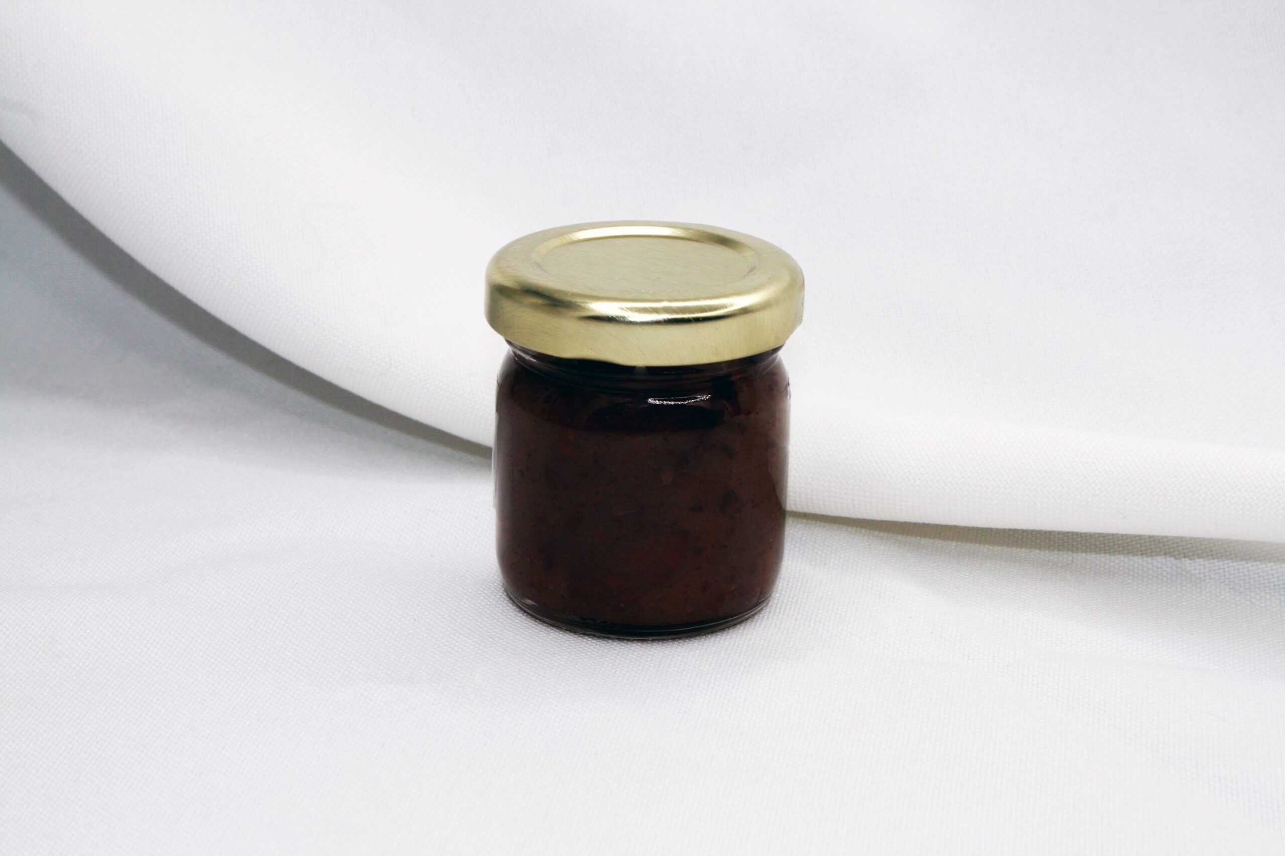 1.5 oz jar of Charoses Jam