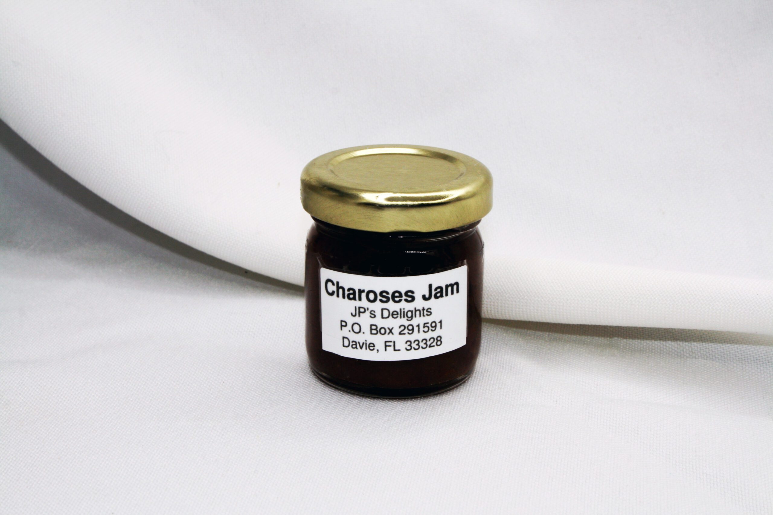 1.5 oz jar of Charoses Jam